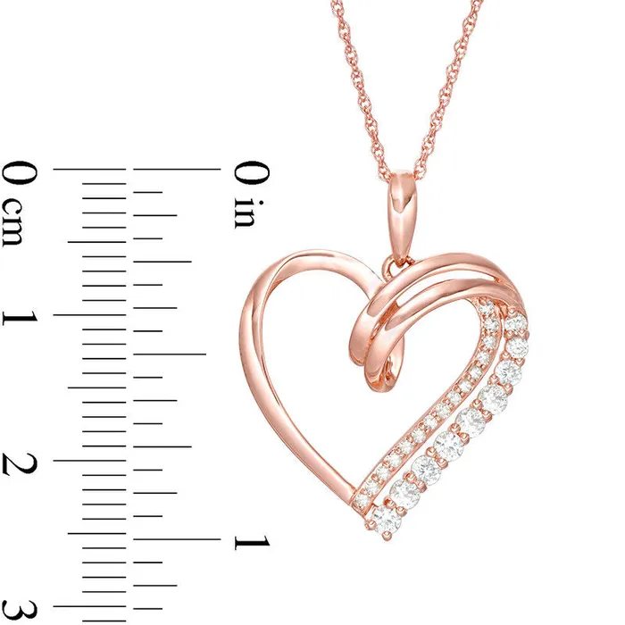 LabCreated White Sapphire and 007 CT TW Diamond Looping Heart Pendant in 10K Rose Gold Goldia Necklaces LabCreated White Sapphire and 007 CT TW Diamond Looping Heart Pendant in 10K Rose Gold Goldia Necklaces